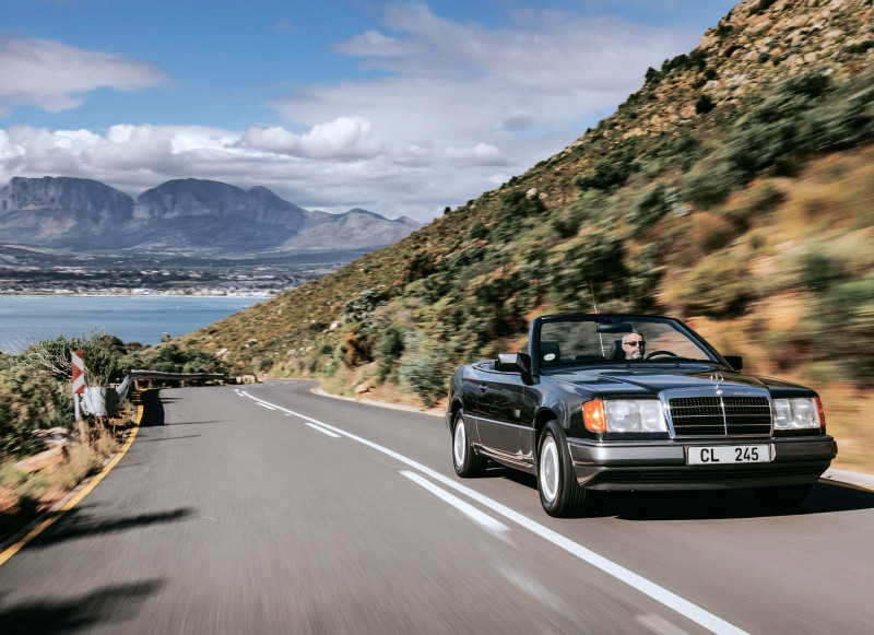 The pre-facelift 124-series Cabriolet is a relatively rare model. In South Africa, a local collector offered us the keys to his top-condition 300CE-24 for a sunset drive on one of the most picturesque roads on the continent.